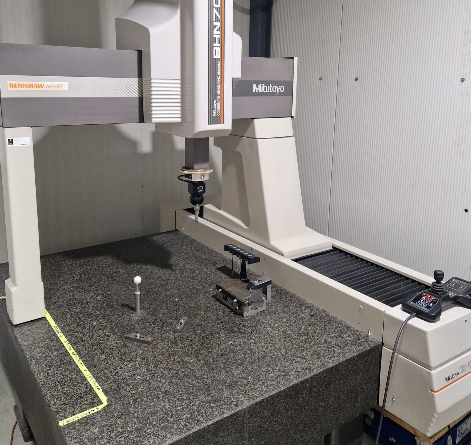 CMM measuring room with a workpiece on the table